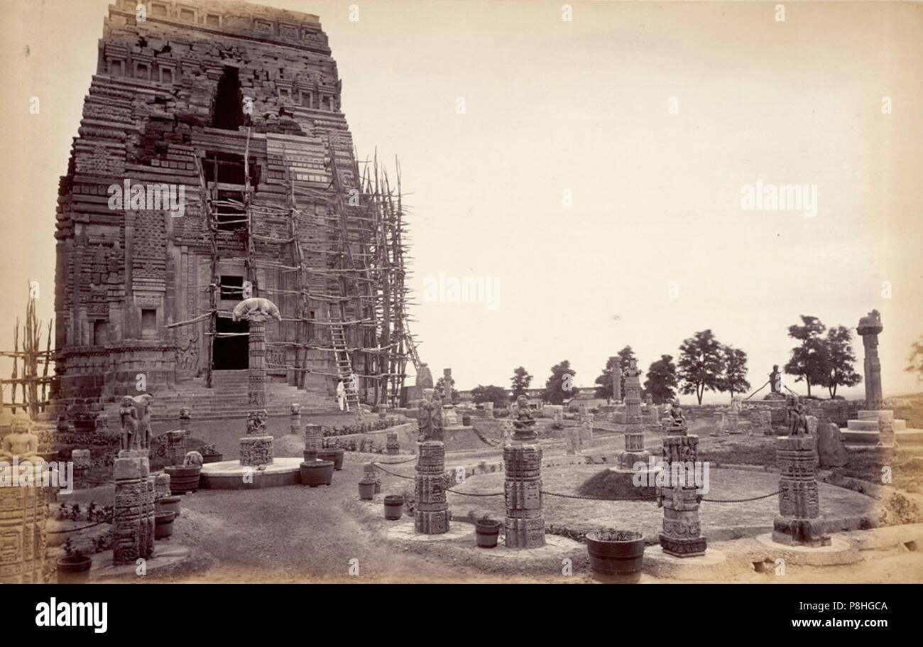 8th or 9th century ruined Teli ka Mandir under restoration in Gwalior fort with temporary ruined statue garden in front, Madhya Pradesh, 1882 photo. Stock Photo
