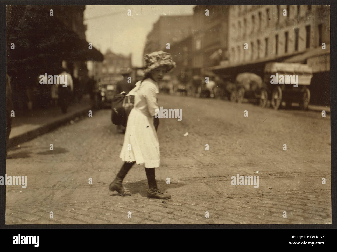 9 Year Old Girl Carrying Garments Down Blackstone Street Boston M To A Hanover Street Home She Finishes 8 Pairs Of Trousers A Day And Gets 8 Cents A 9 Year Old Girl Carrying Garments Down Blackstone Street Boston M To A Hanover Street Home She Finishes 8 Pairs Of Trousers A Day And Gets 8 Cents A