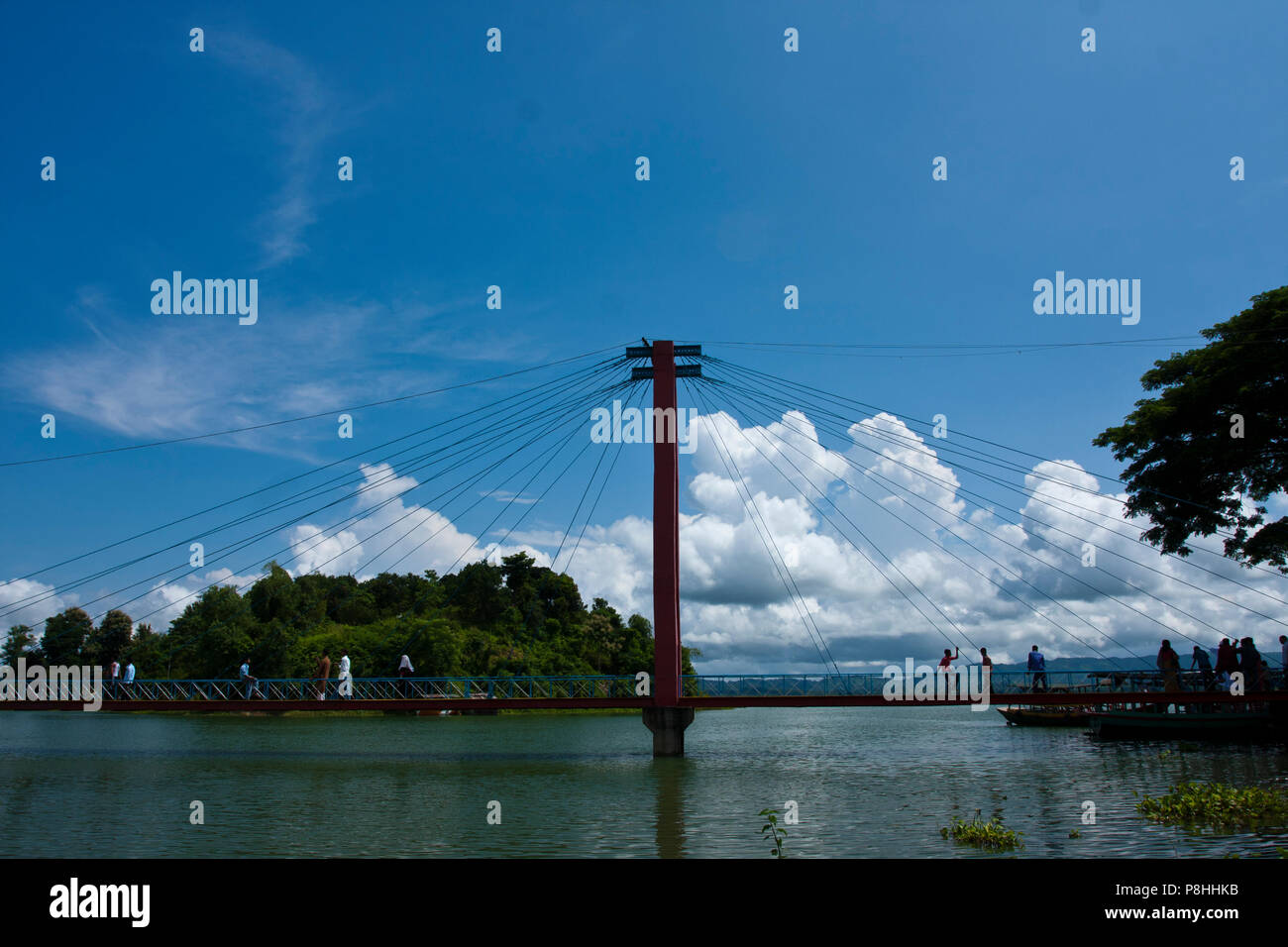 A Hanging bridge on Kaptai Lake in Rangamati. Kaptai Lake is a man; made lake in south; eastern Bangladesh. It is located in the Rangamati District of Stock Photo