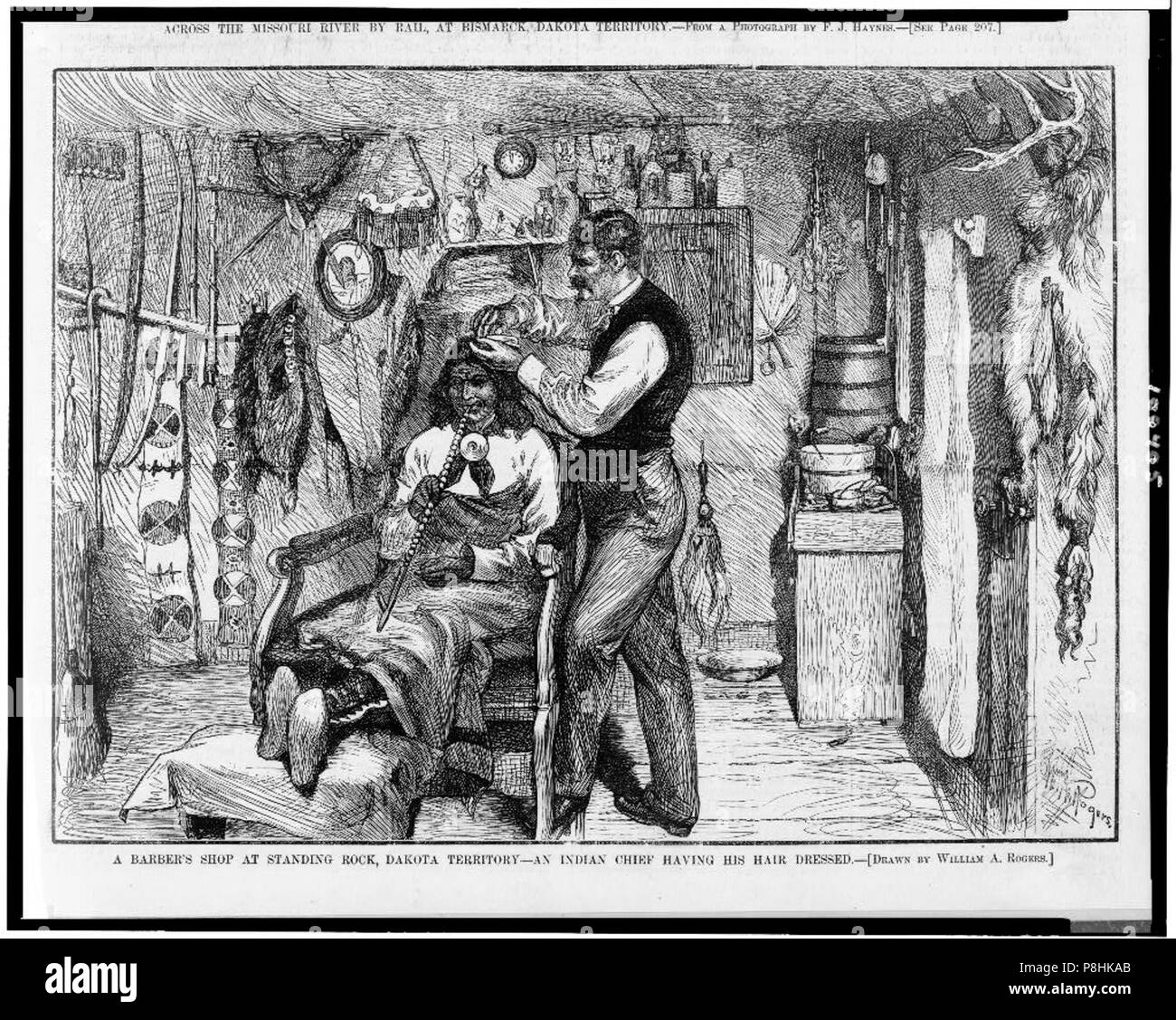 A barber's shop at Standing Rock, Dakota Territory-an Indian chief having his hair dressed - drawn by William A. Rogers. Stock Photo