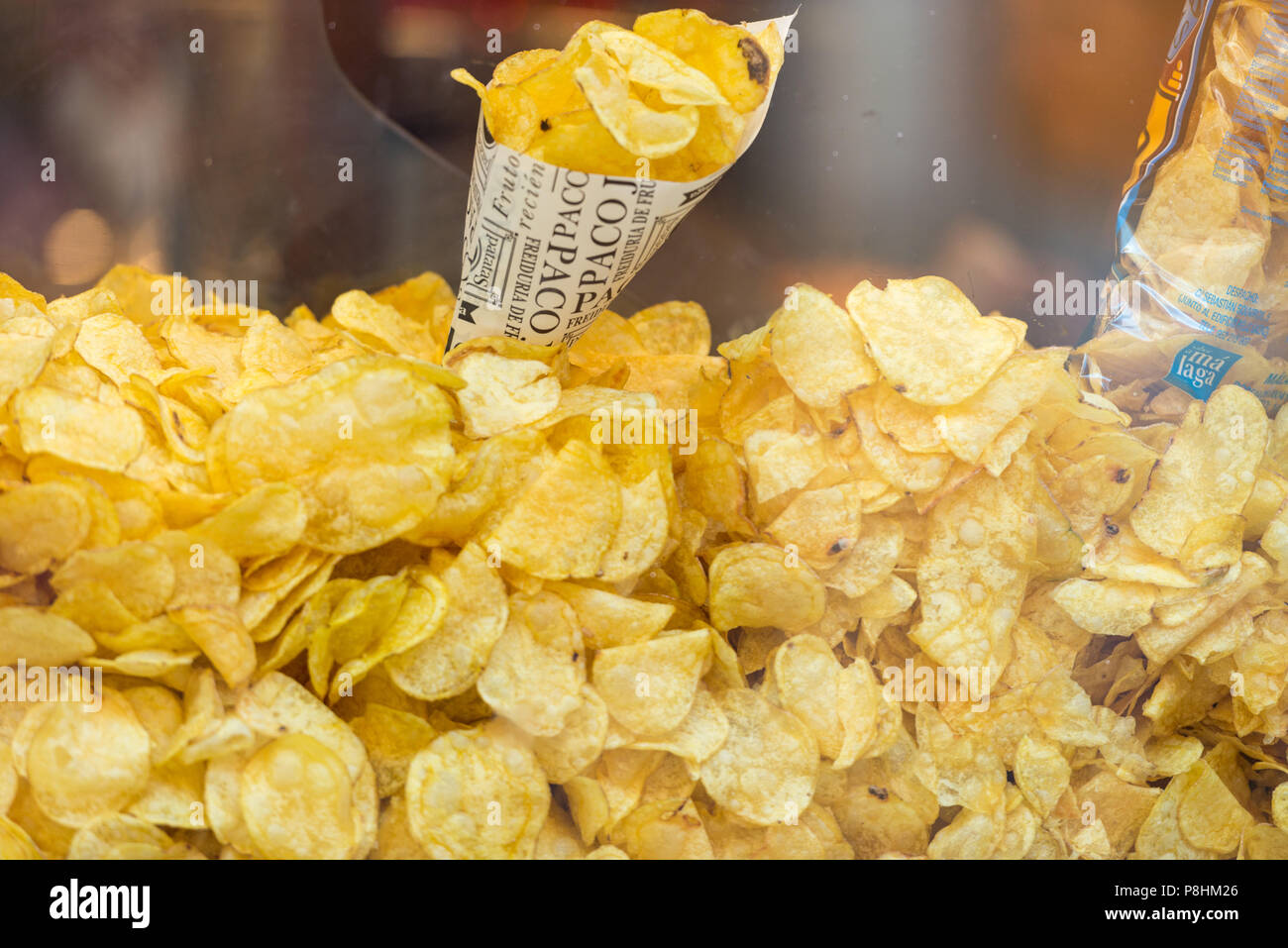 of fried potatoes in a store in the streets of Malaga, Spain