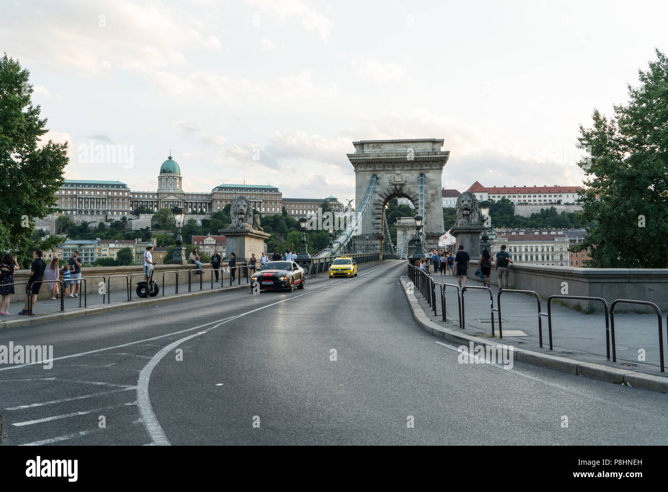 A view of the traffic in the Chains bridgeat sunset in Budapest, Hungary Stock Photo