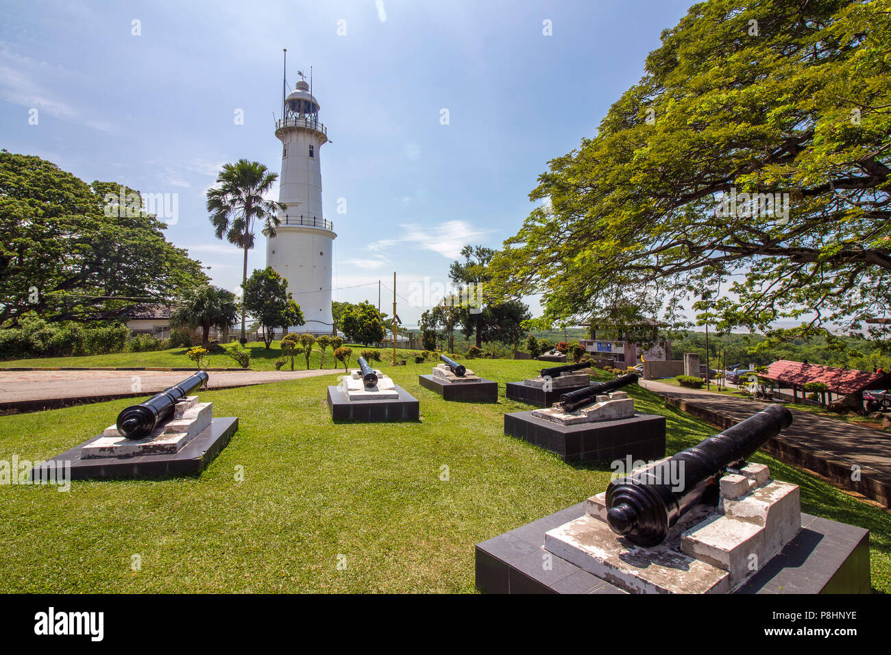 Altingsburg Lighthouse and cannons located at Melawati Hill, Kuala Selangor, Malaysia, it was built in 1907 and used extensively during the British co Stock Photo