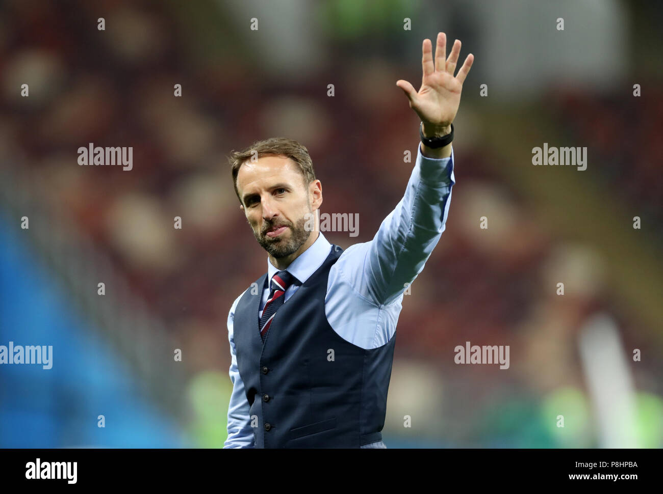 England manager Gareth Southgate wavesto fans after the FIFA World Cup, Semi Final match at the Luzhniki Stadium, Moscow. PRESS ASSOCIATION Photo. Picture date: Wednesday July 11, 2018. See PA story WORLDCUP Croatia. Photo credit should read: Owen Humphreys/PA Wire. Stock Photo