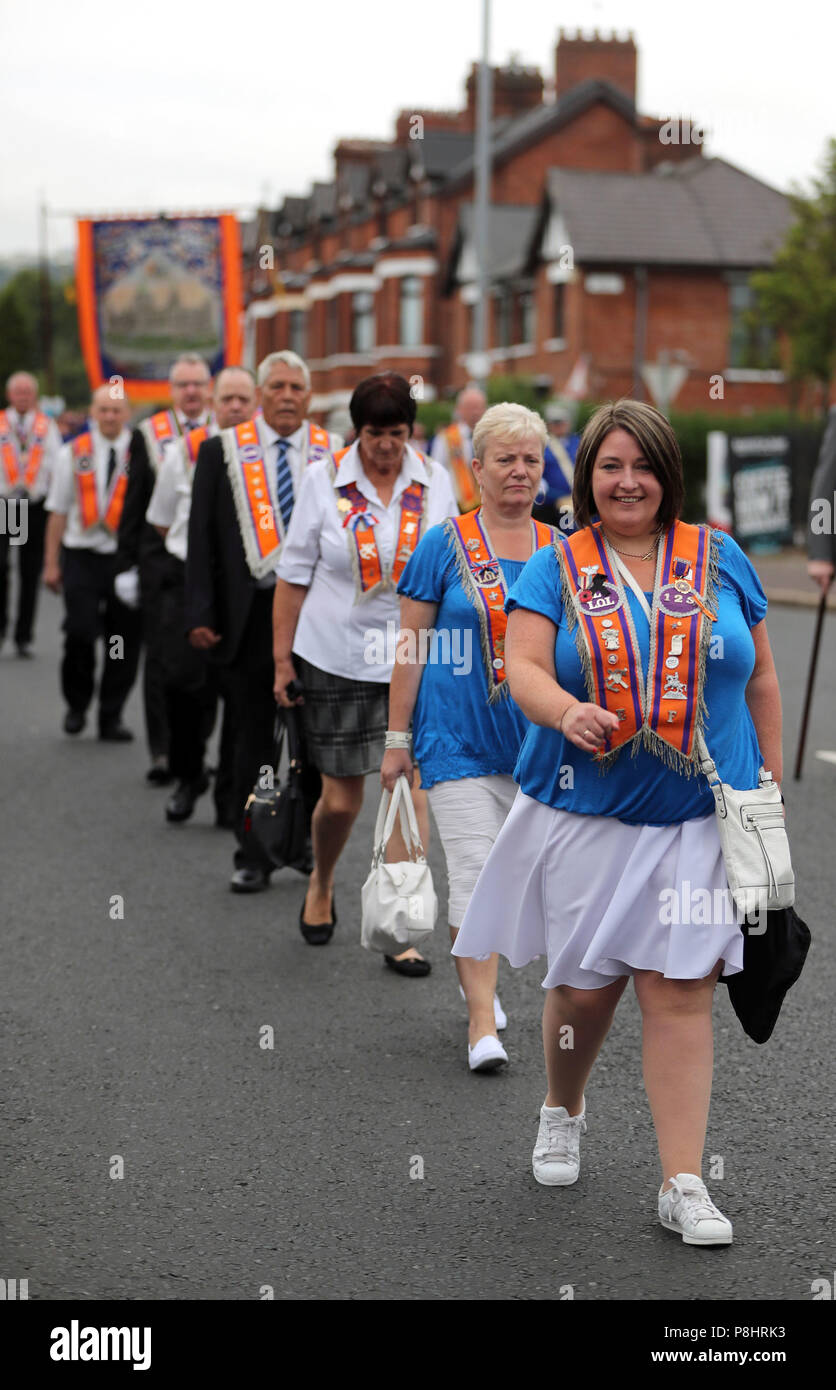 An Orange Order parade in the Ardoyne area of Belfast, as part of the annual Twelfth of July celebrations, marking the victory of King William III's victory over James II at the Battle of the Boyne in 1690. Stock Photo