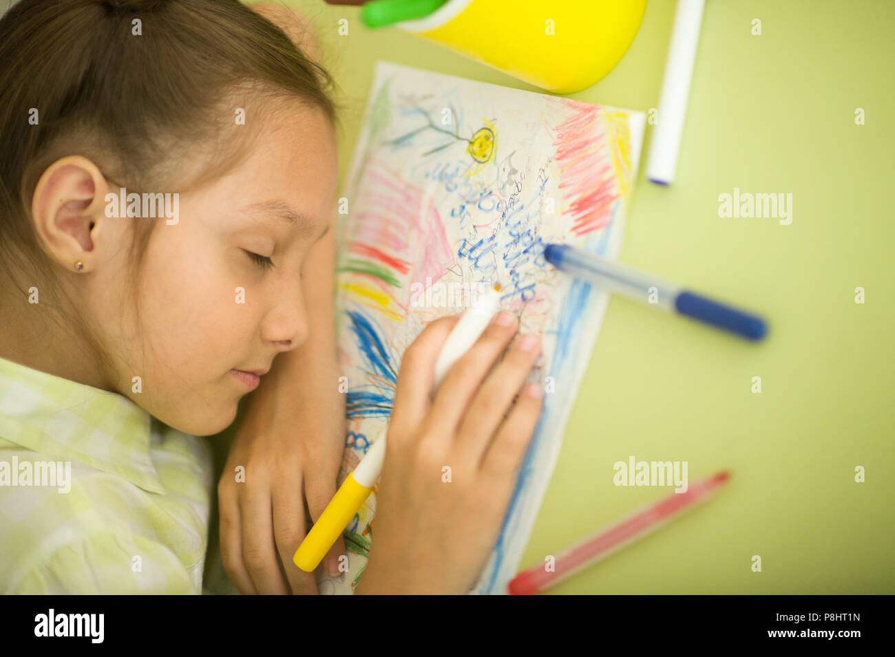 Tired schoolgirl fall asleep  Stock Photo