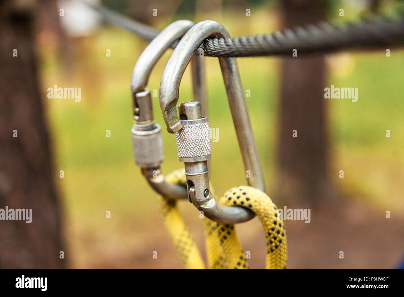 Carabiners weigh on safety rope Stock Photo