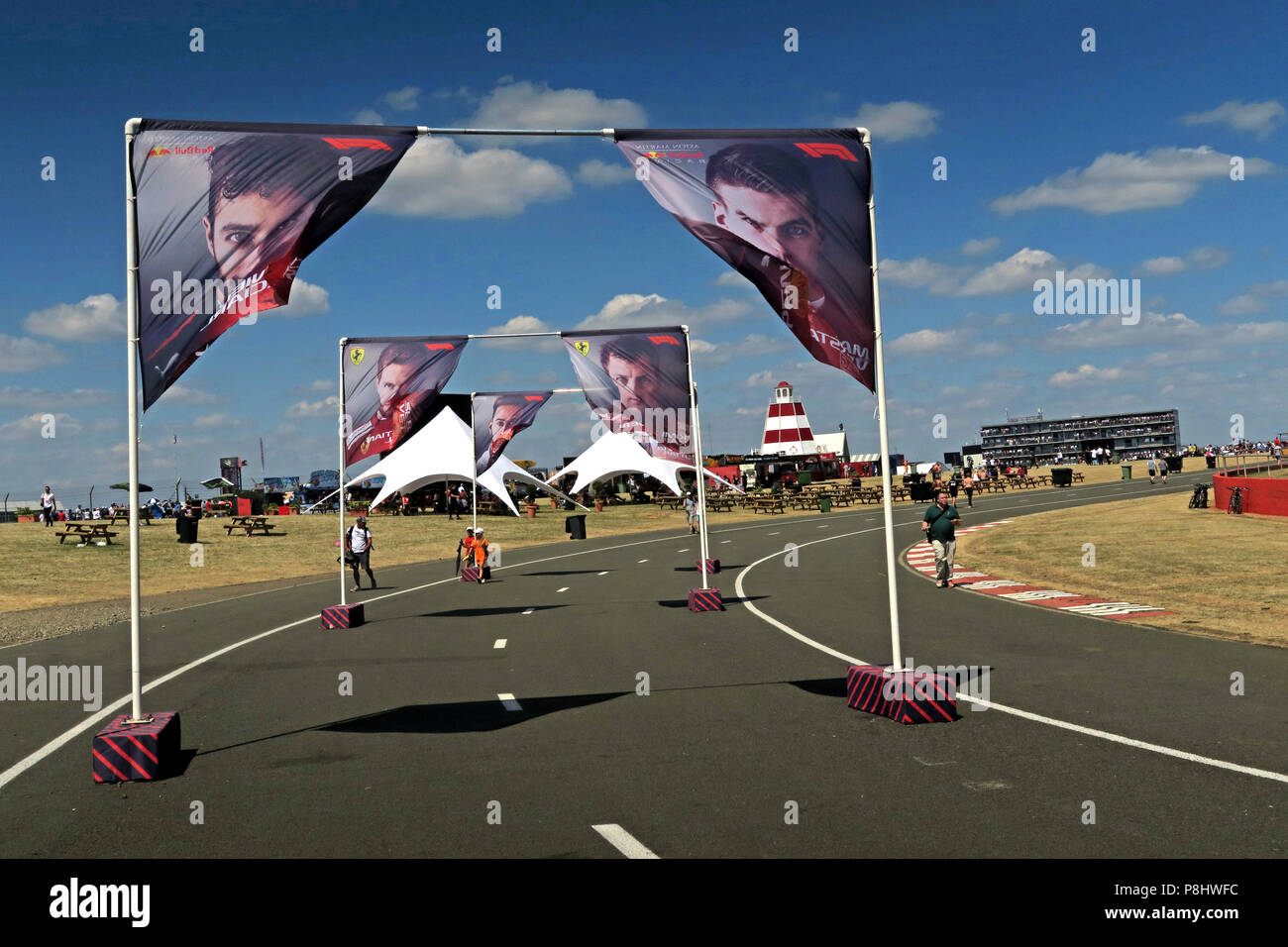 F1 driver images on flags, Silverstone circuit, Northampton, British Grand Prix 2018, England, UK Stock Photo