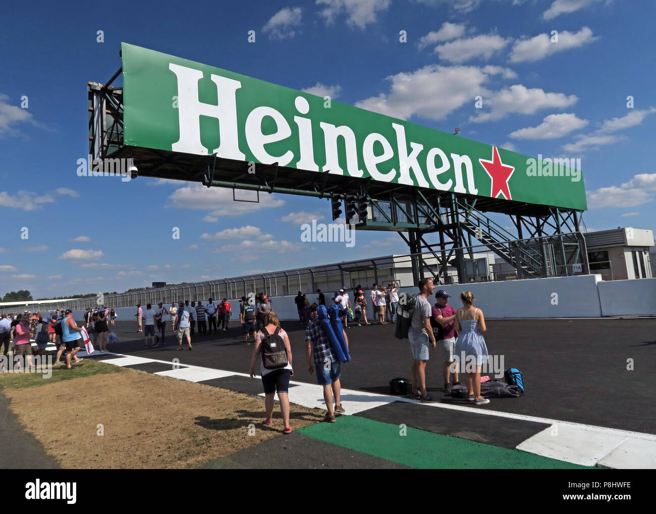 Heineken Lager Beer advertising at The British Grand Prix, trackside, Silverstone, Silverstone Circuit, Towcester, Northampton, England, UK,  NN12 8TL Stock Photo