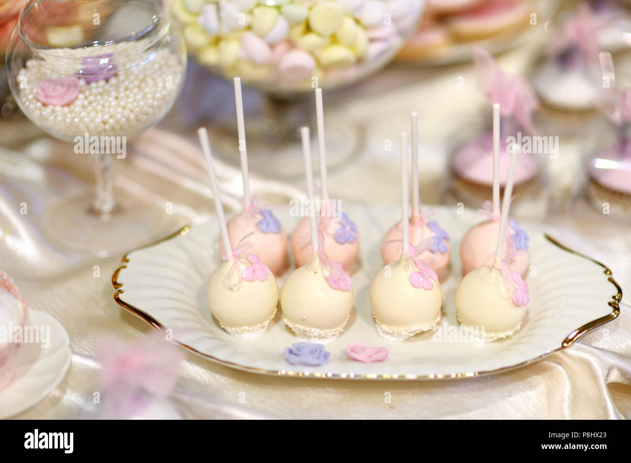 Delicious Wedding Cake Pops In Pink And Purple Stock Photo