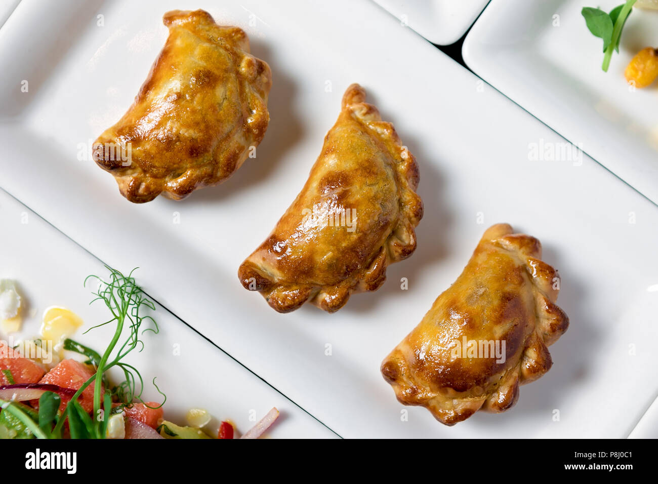 Plate of bite size meat patties Stock Photo