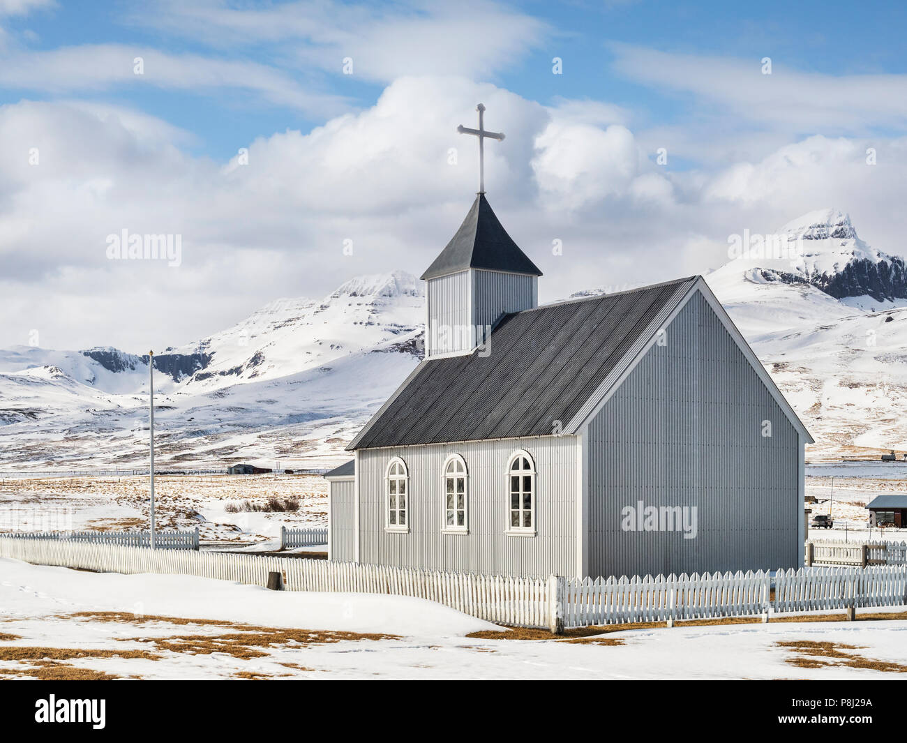 Traditional style church in the village of Bakkagerdi, in north east Iceland Stock Photo