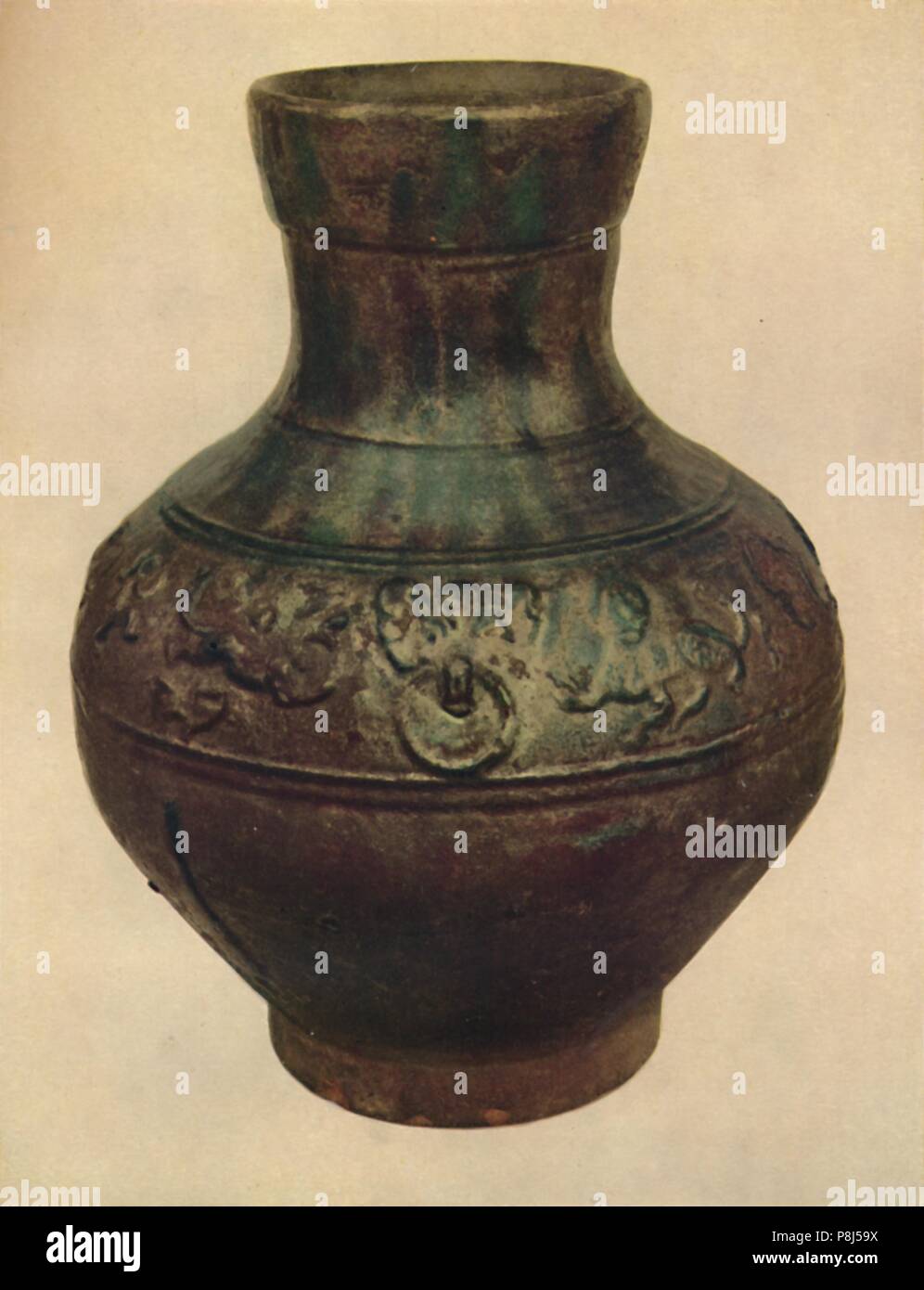 'Wine Jar with Hunting Scene in Relief. Han Dynasty, 206 BC - AD 221, (1927). Artists: Edward F Strange, Unknown. Stock Photo