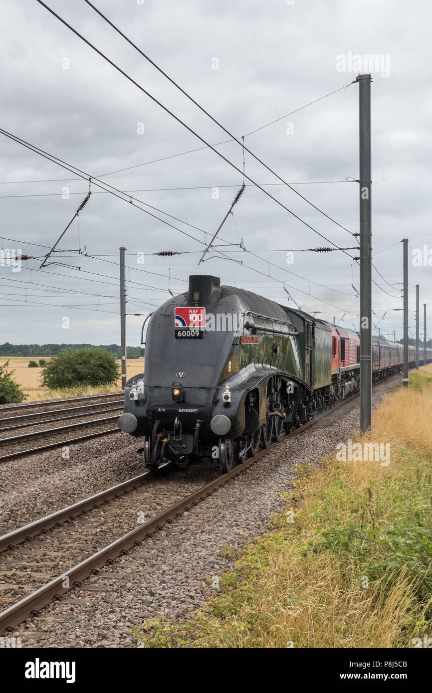 Sandy, United Kingdom. 10th July 2018. Nigel Gresley designed A4 pacific 60009 Union of South Africa approaches Sandy station with the RAF 100 charter Stock Photo