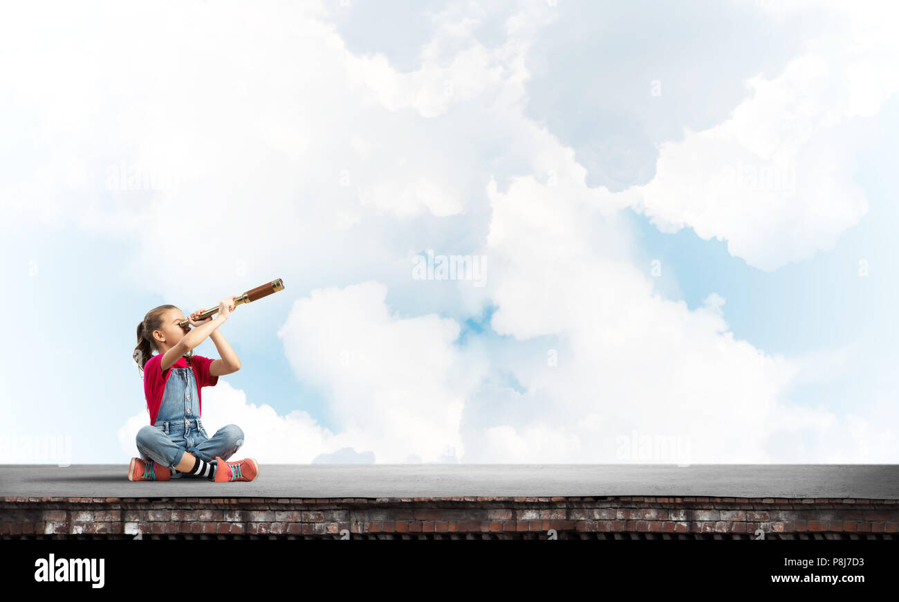 Concept of careless happy childhood with girl exploring this world ...