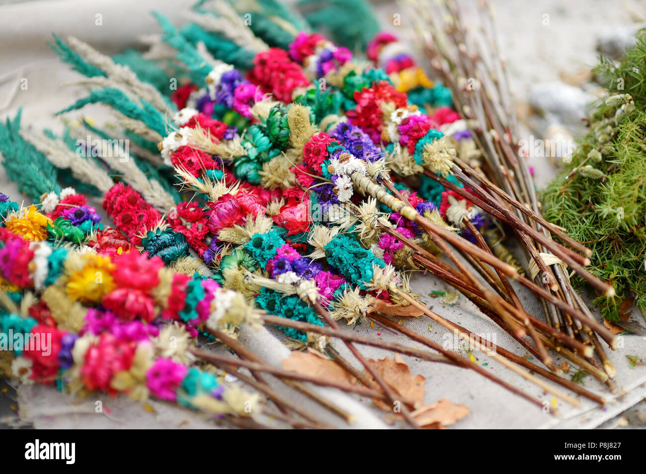 Traditional lithuanian Easter decorative palm bouquets sold on spring market Stock Photo