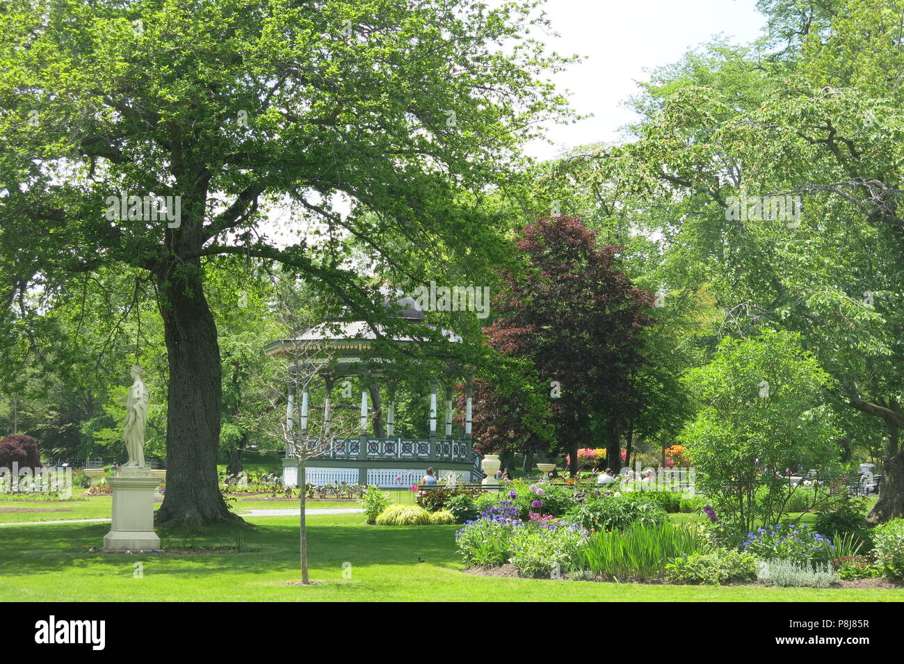 The Halifax Public Gardens have been an oasis of calm and colour since Victorian times; features include a bandstand, statues & fountains Stock Photo