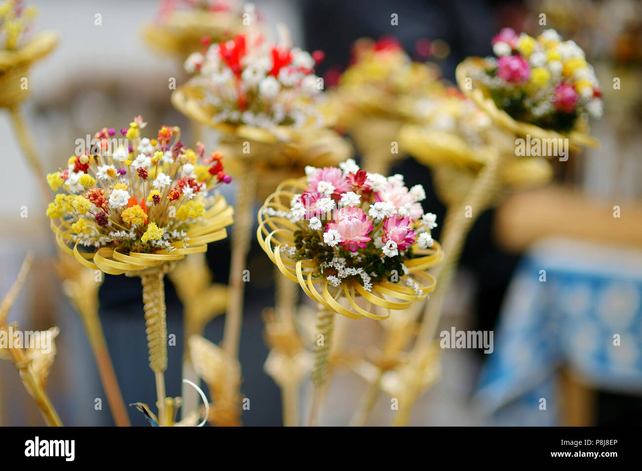 Traditional lithuanian Easter decorative palm bouquets sold on spring market Stock Photo