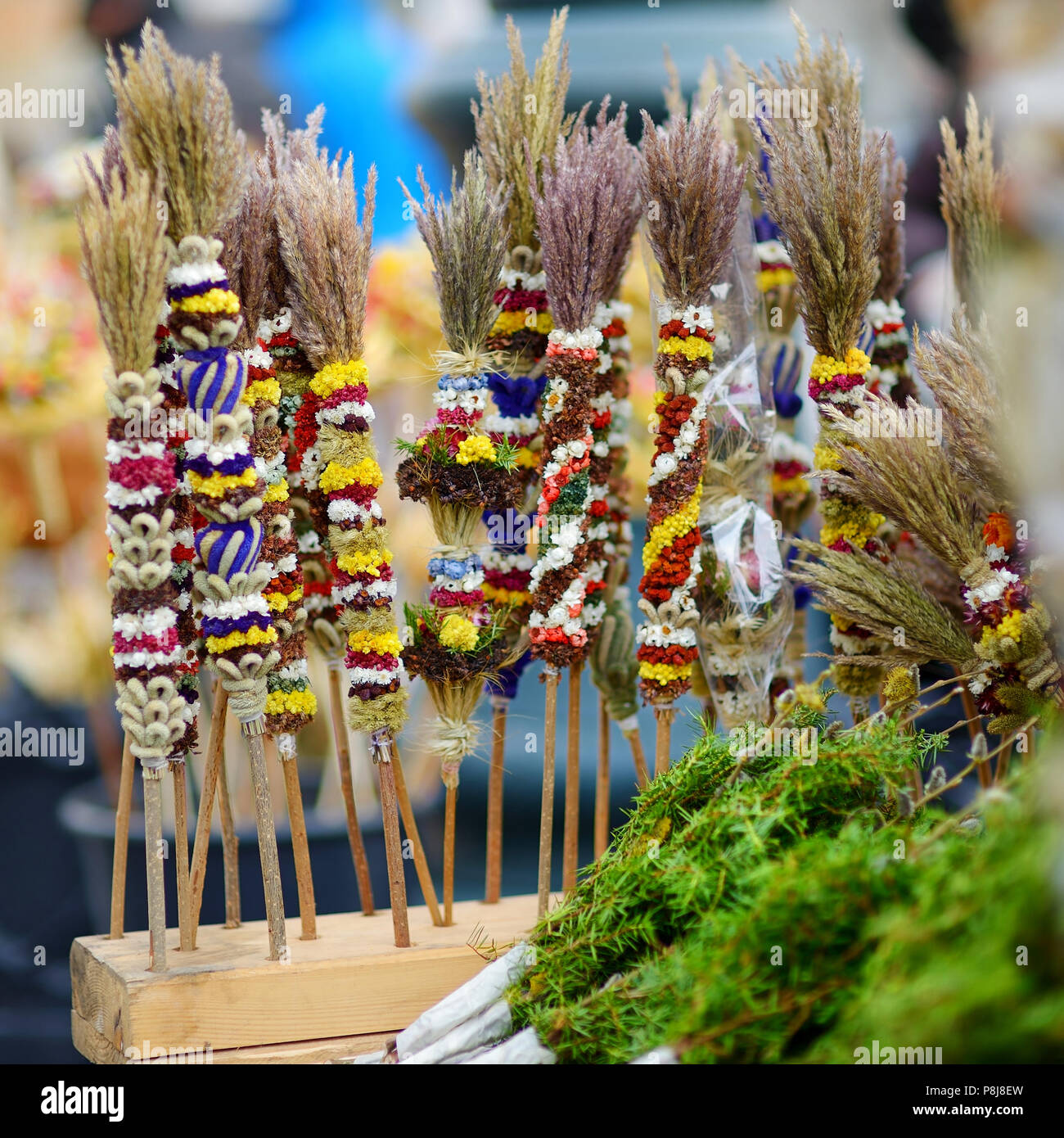 Traditional lithuanian Easter decorative palm bouquets sold on spring market Stock Photo