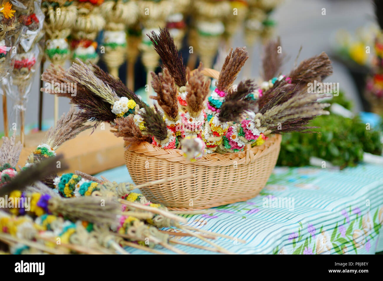 Traditional lithuanian Easter decorative palm bouquets sold on spring market Stock Photo