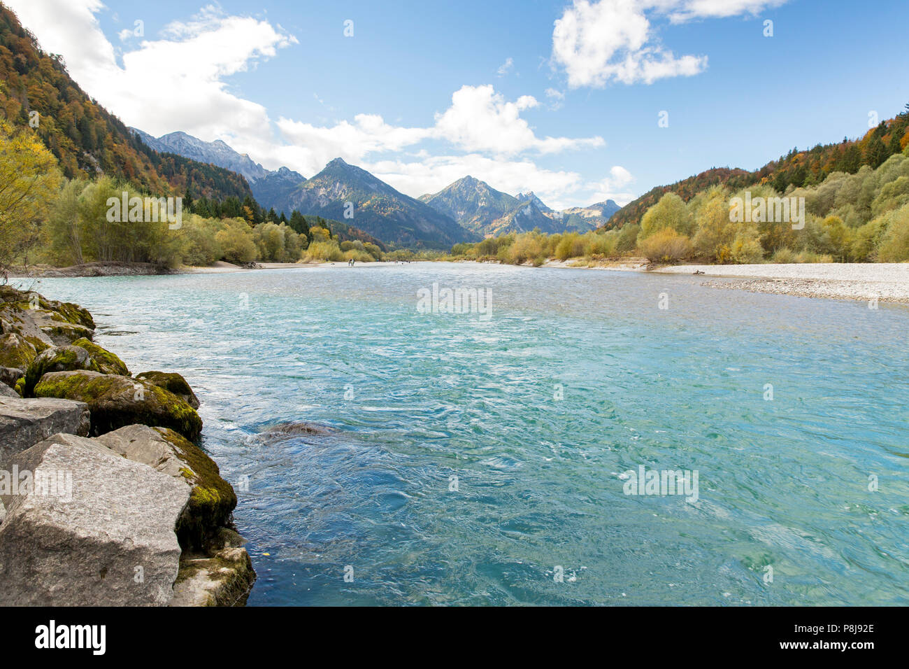 The river Lech with autumnal forest near the Ziegelwiesen, Füssen, Bavaria, Germany Stock Photo