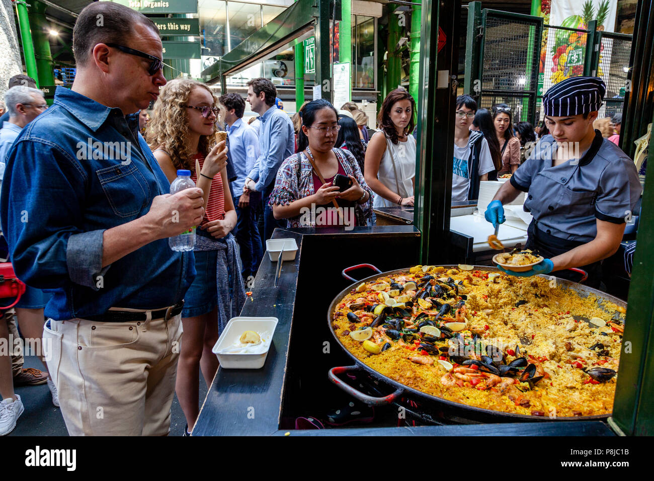 Takeaway Food Being Served At Borough Market, London, England Stock Photo