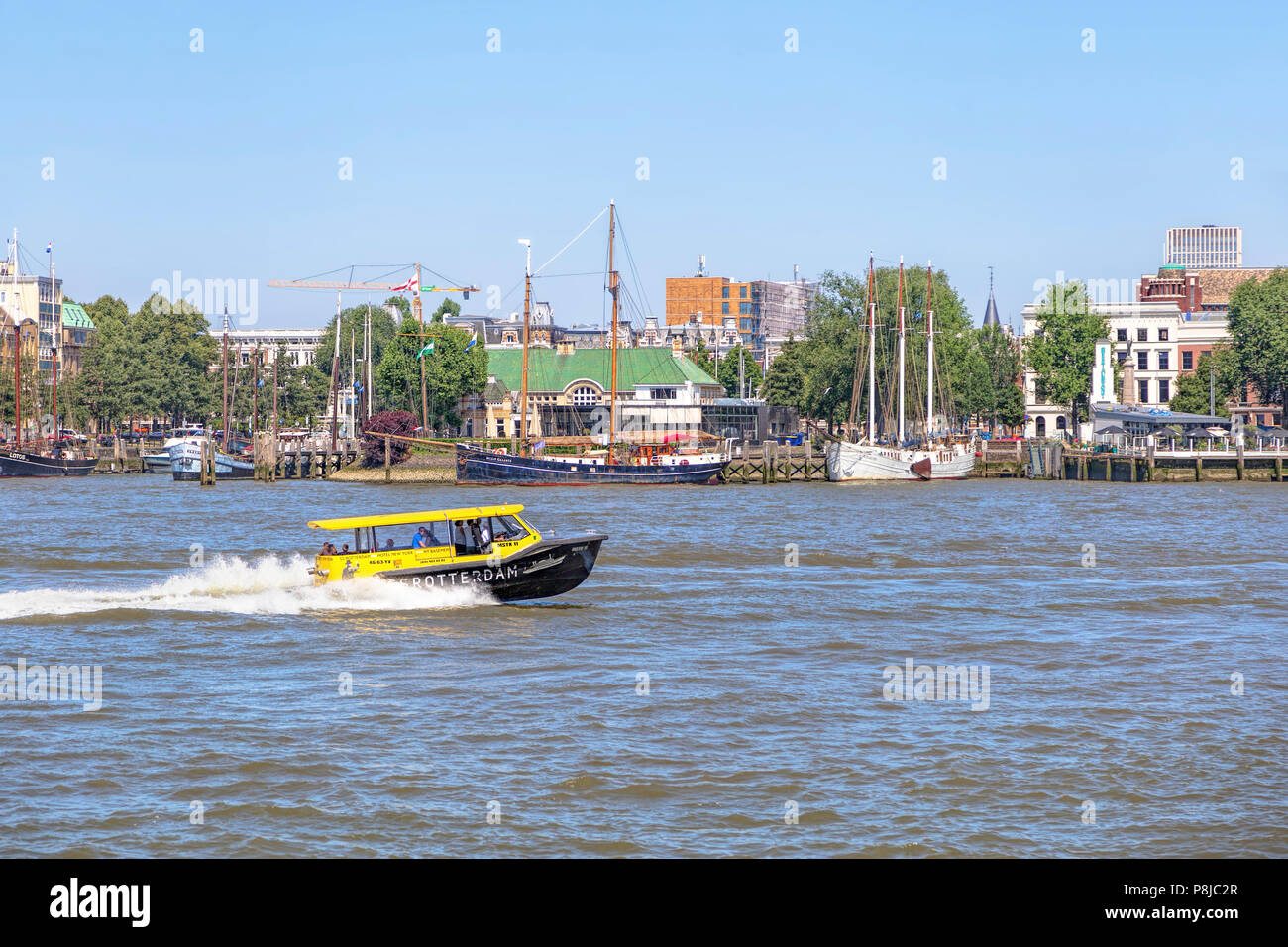 Water taxi on Nieuwe Maas, in Rotterdam, South Holland, The Netherlands Stock Photo