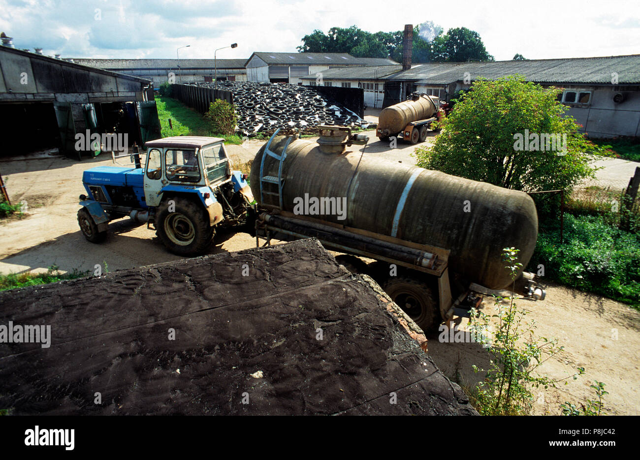 Farm with tractor in Amt Neuhaus. Stock Photo