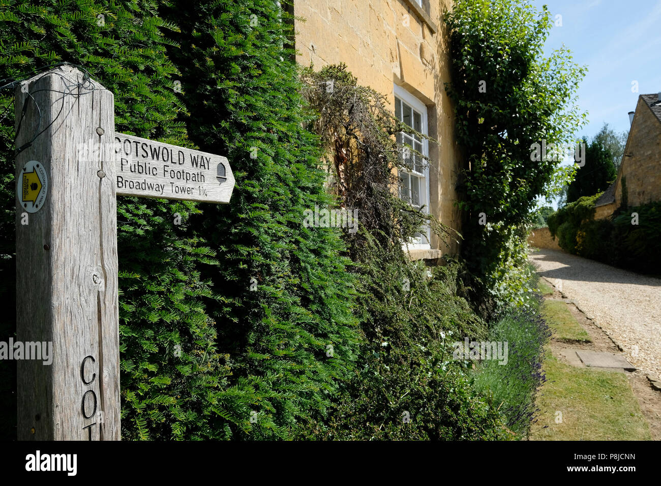 Direction sign on The Cotswold Way at Broadway village in The Cotswolds Stock Photo