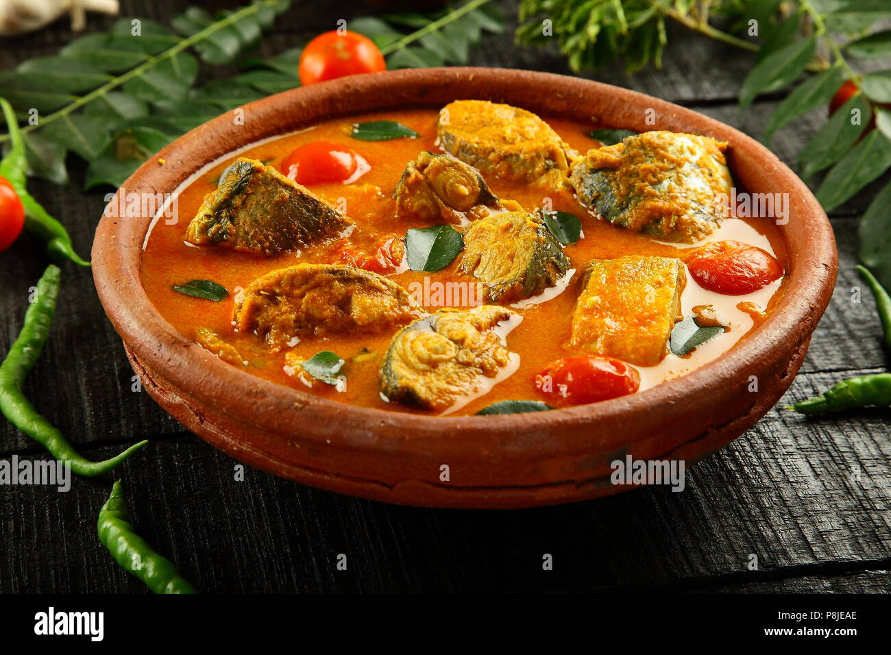 Spicy fish curry in coconut gravy, Indian traditional seafood recipes, Stock Photo