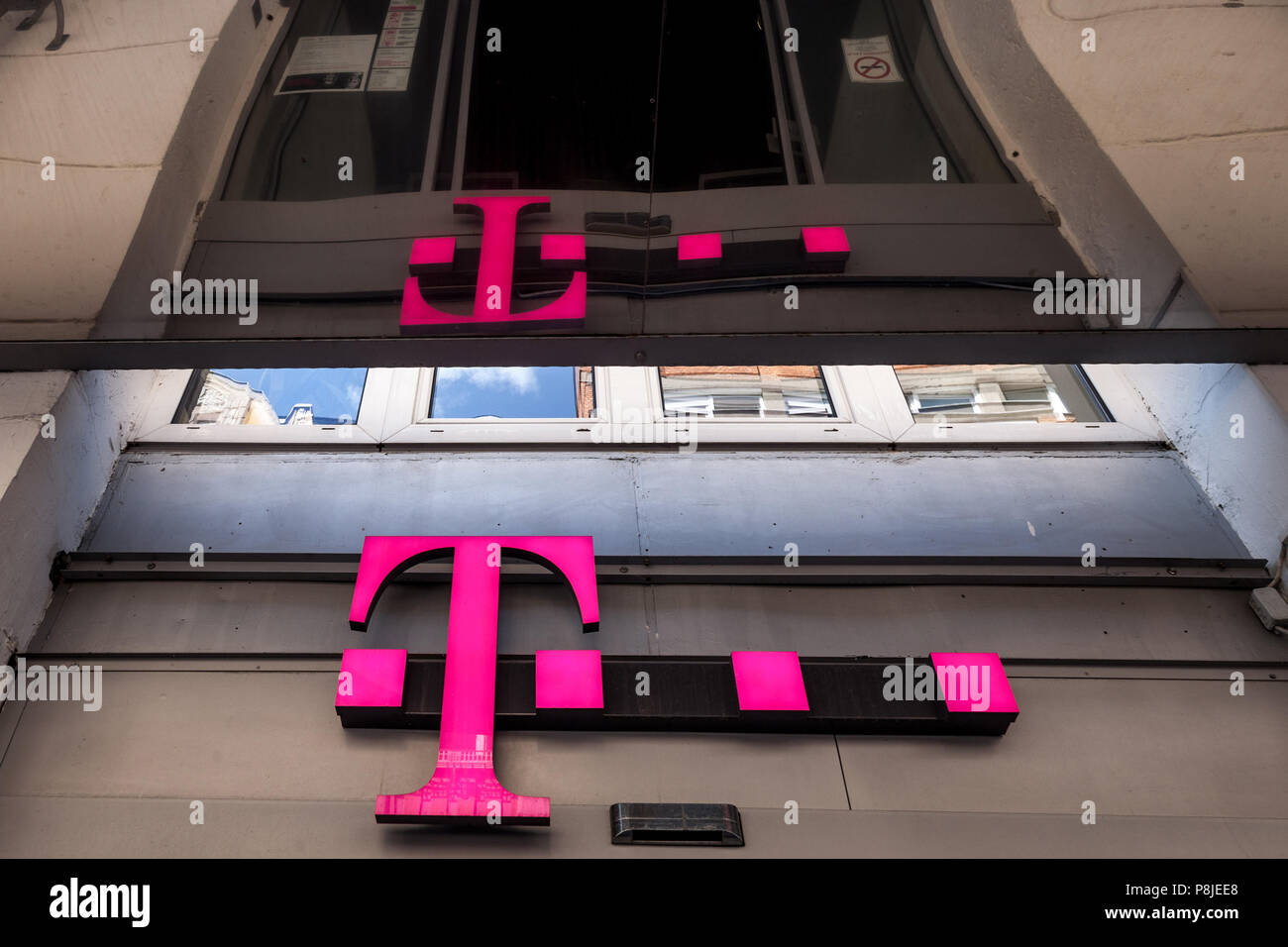 SZEGED, HUNGARY - JULY 3, 2018: T Mobile Logo on their main shop in Szeged. T-Mobile, is one of the main mobile network operator in Hungary belonging  Stock Photo