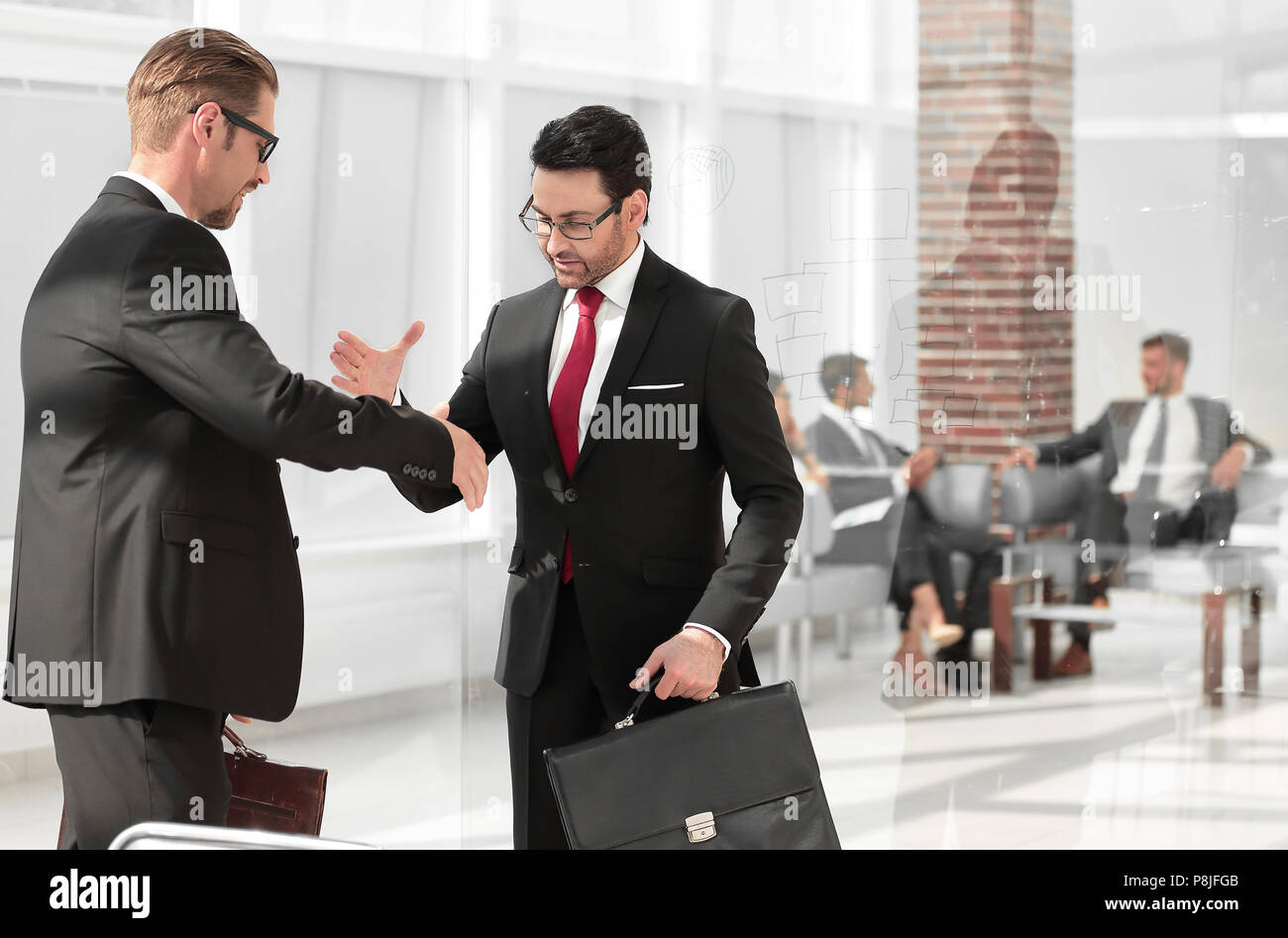 Business people closing a deal Stock Photo - Alamy