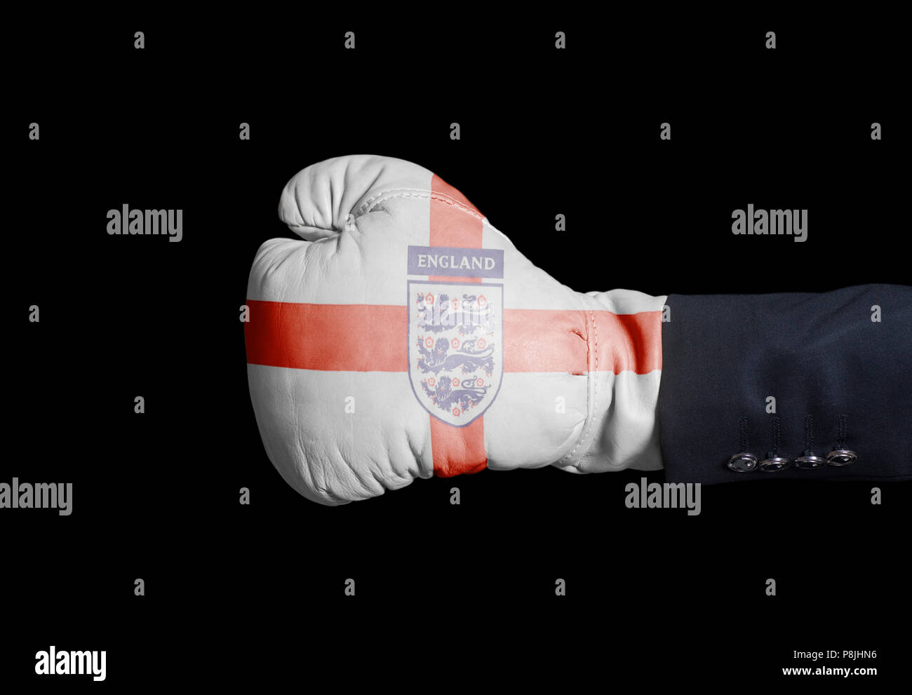 Male hand in Boxing glove with Three Lions Soccer England National Football Team Flag on black Stock Photo