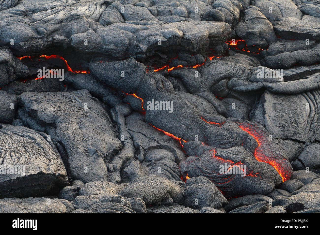 Fresh pahoehoe lava flow from the Puu oo vent on the flanks of Kilauea volcano, on the Big Island of Hawai'i Stock Photo