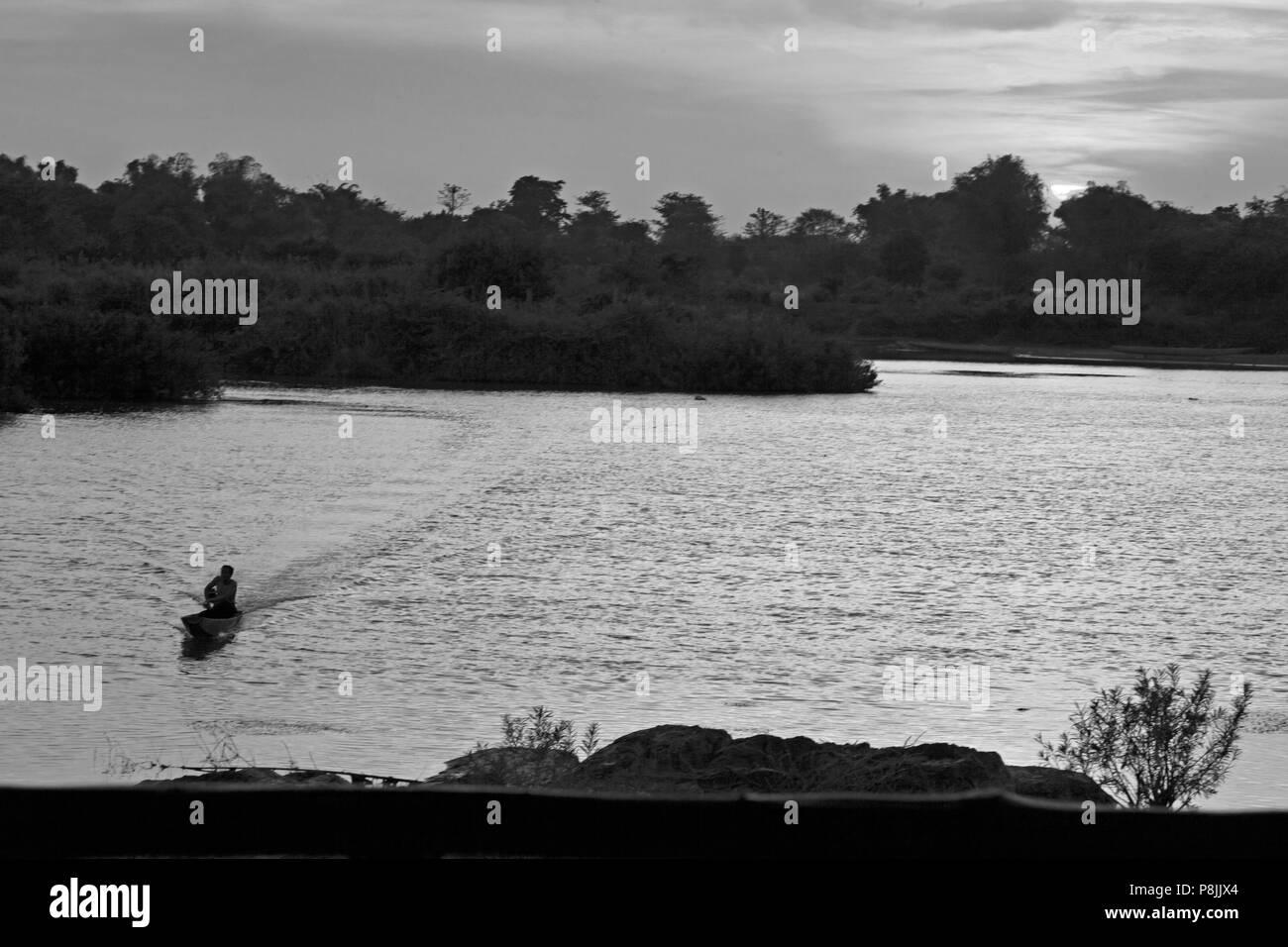 Sunset on DON DET ISLAND in the 4 Thousand Islands Area (Si Phan Don) of the MEKONG RIVER - SOUTHERN, LAOS Stock Photo