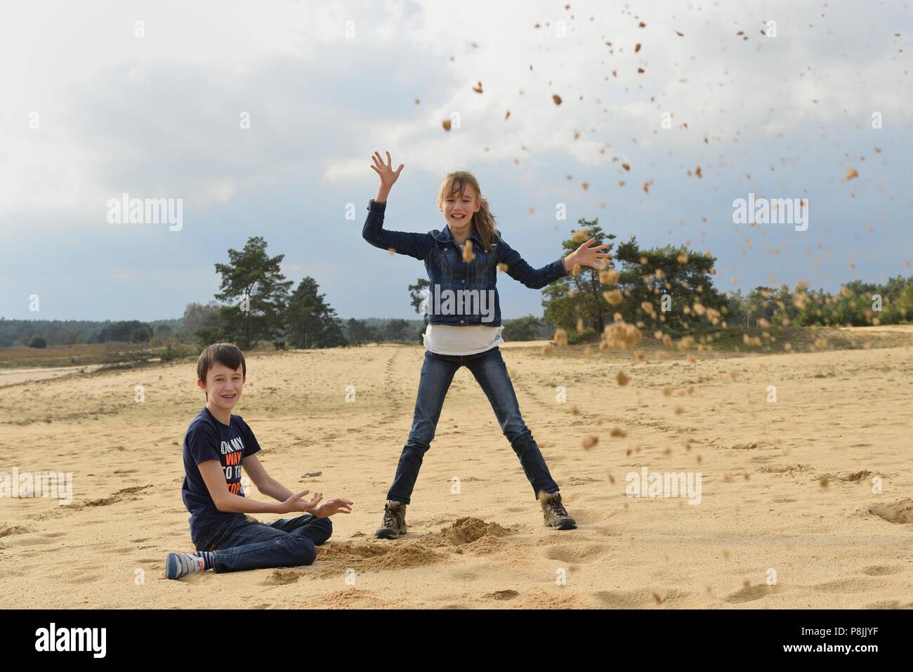 Children playing with sand on the Rozendaalse zand'' Stock Photo