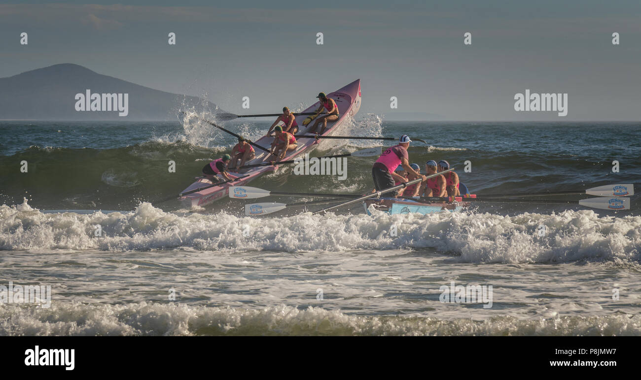 Pacific Palms,New South Wales,Australia. February 25, 2018. Battle of the boats, unidentified surf boat rowers take to the water in NSW Australia. Stock Photo