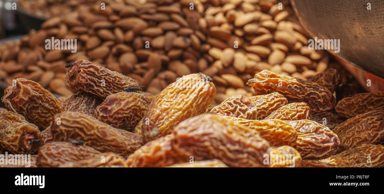 Datepalm nuts for sale at local market in Old Delhi, India Stock Photo