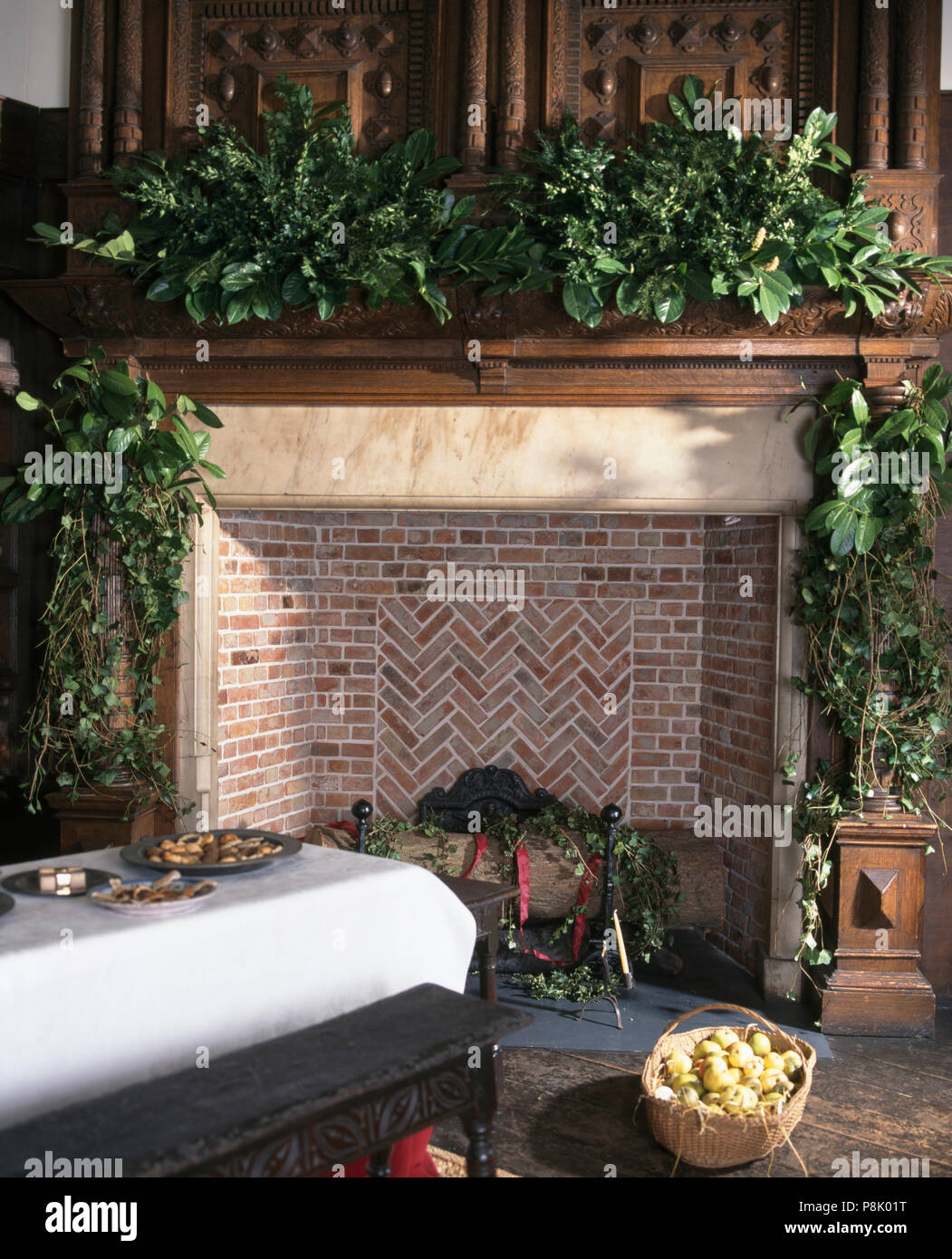 Fresh Ivy And Laurel Christmas Garland On Traditional Fireplace