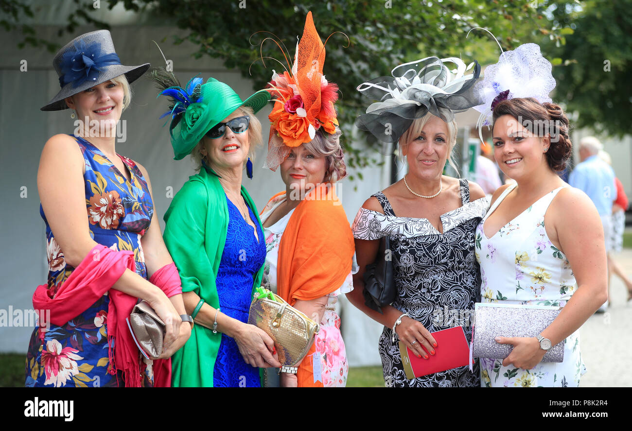 Racegoers arrive for day one of The Moet & Chandon July Festival at ...