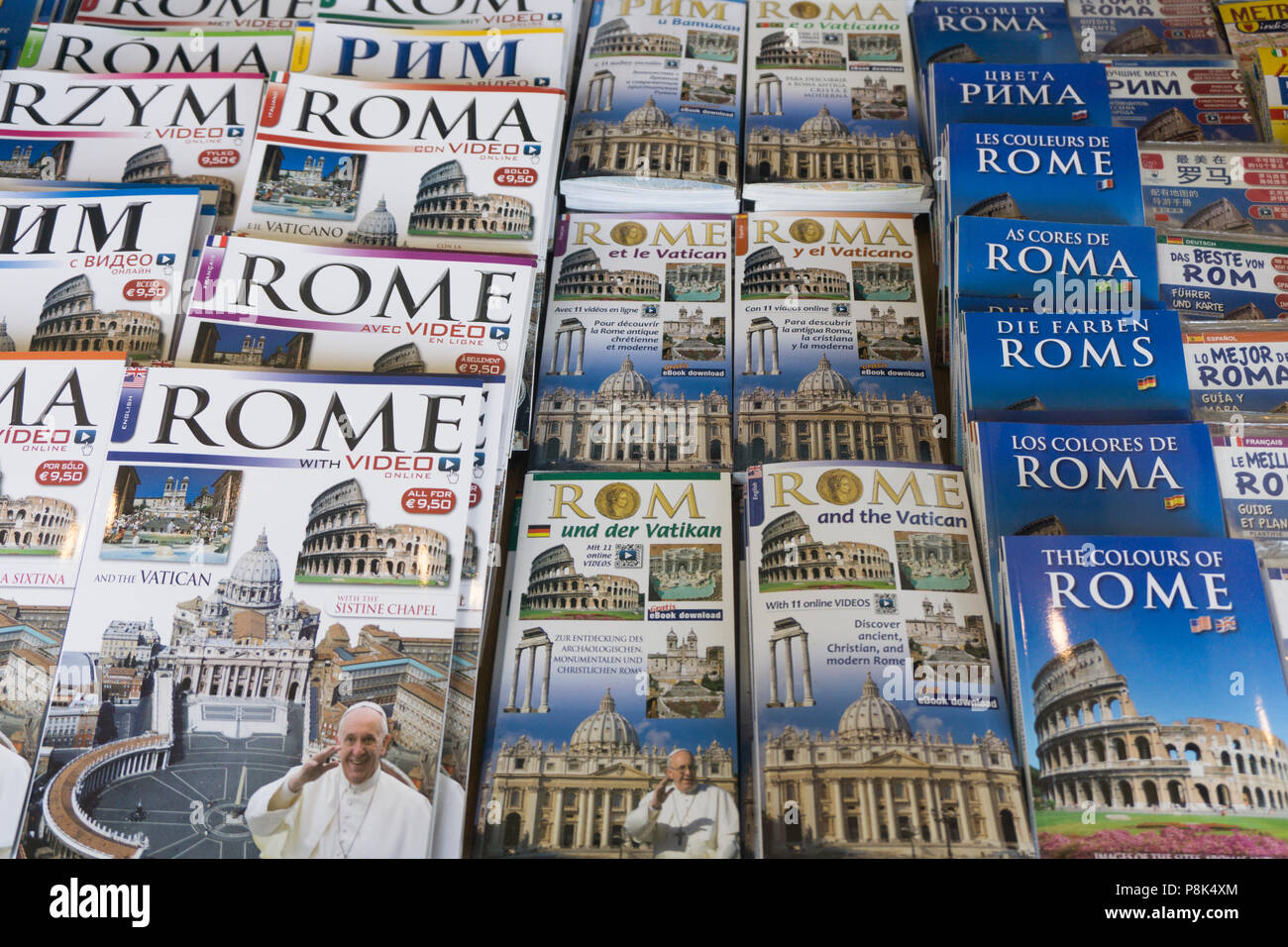ROME, ITALY - JUNE 16th 2018: Tourist travel guide books for Rome on sale at a market Stock Photo