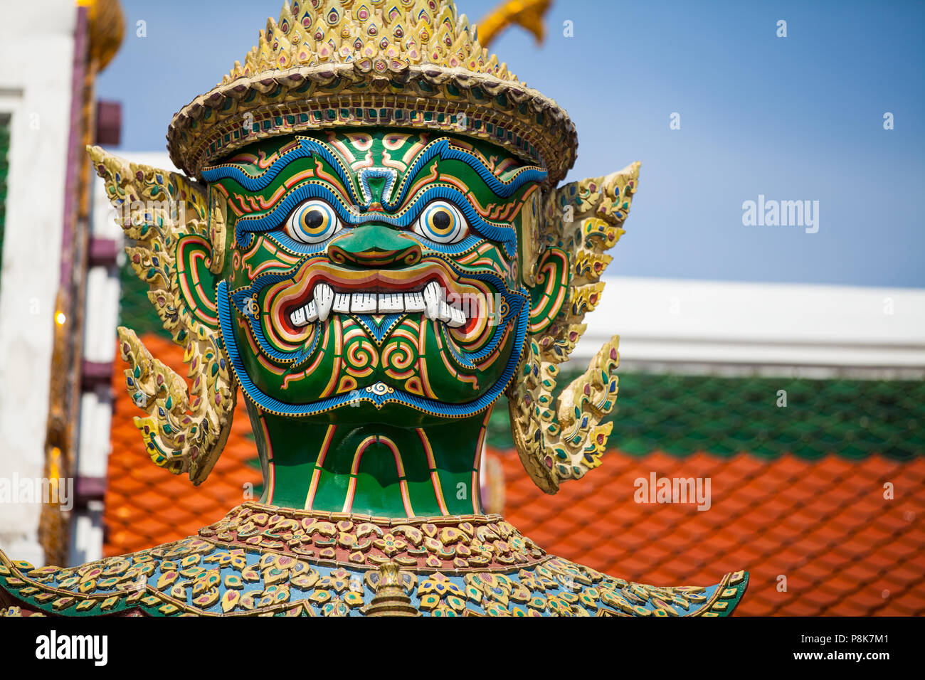 Thotsakhirithon, giant demon (Yaksha) guarding an exit to Grand Palace at the Wat Phra Kaew in Bangkok, Thailand Stock Photo