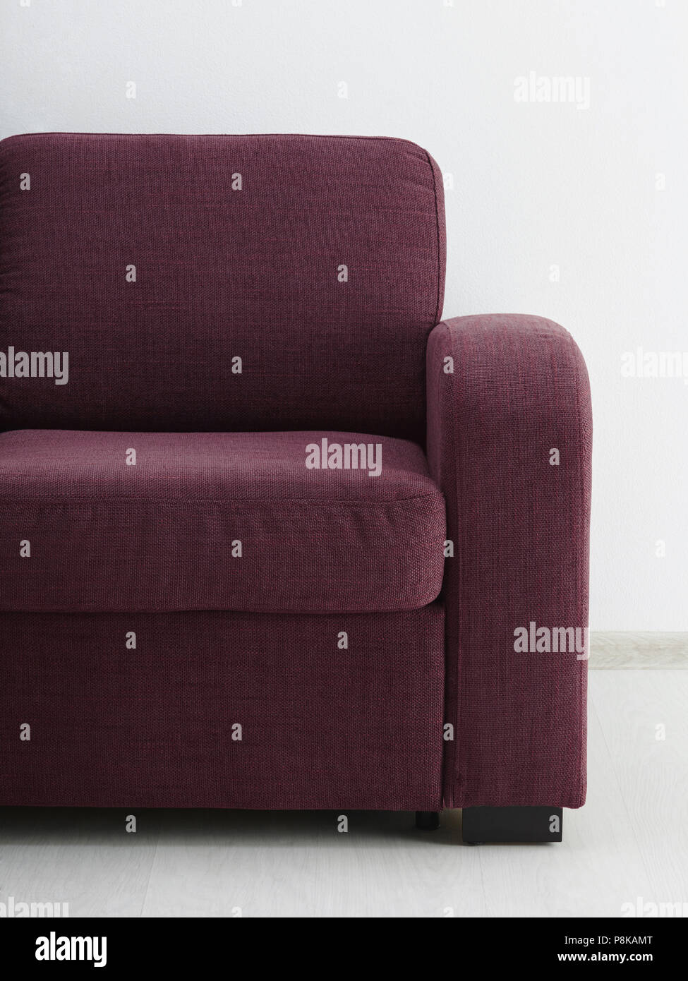 Sofa in white room. Close-up Stock Photo