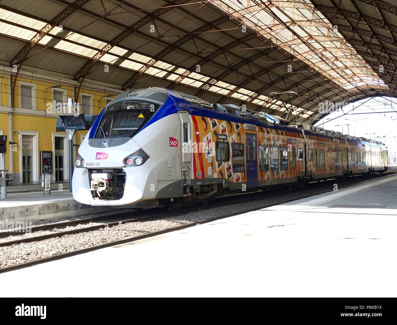 Passenger train in the Avignon Centre train station, Avignon, France ...