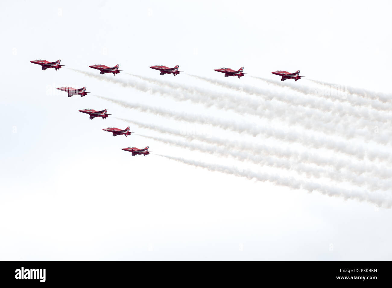The Red Arrows fly in formation at the Flypast over London to commemorate 100 years and 100 Days since the first World War ended Stock Photo