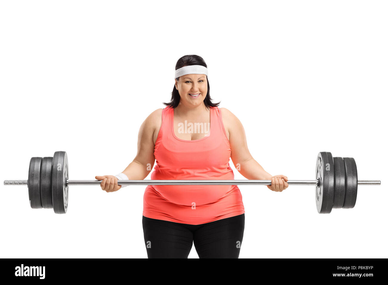 Overweight woman lifting a barbell isolated on white background Stock