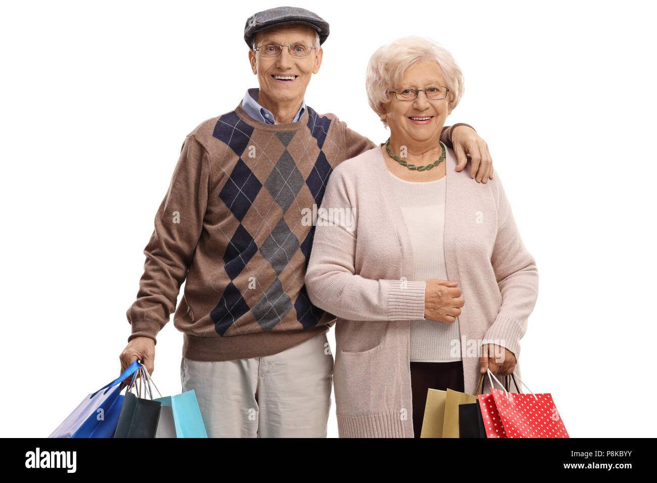 Seniors with shopping bags isolated on white background Stock Photo Alamy