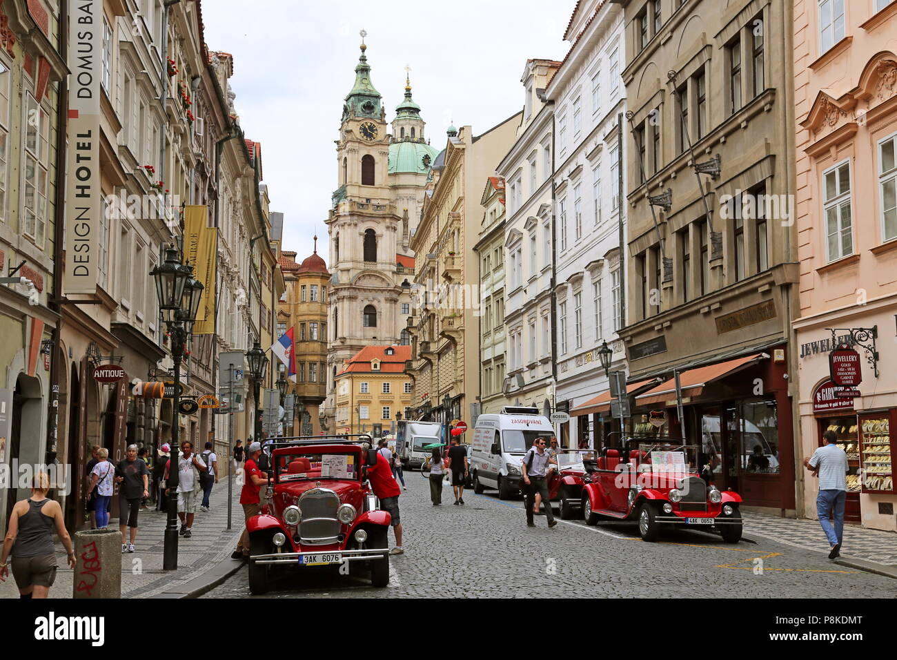 Replica vintage car tours wait for business, Mostecká, Malá Strana (Little Quarter), Prague, Czechia (Czech Republic), Europe Stock Photo