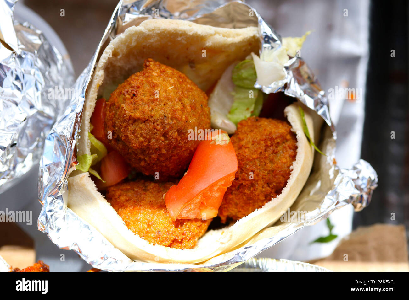 Falafel wrapped in pita bread Stock Photo Alamy
