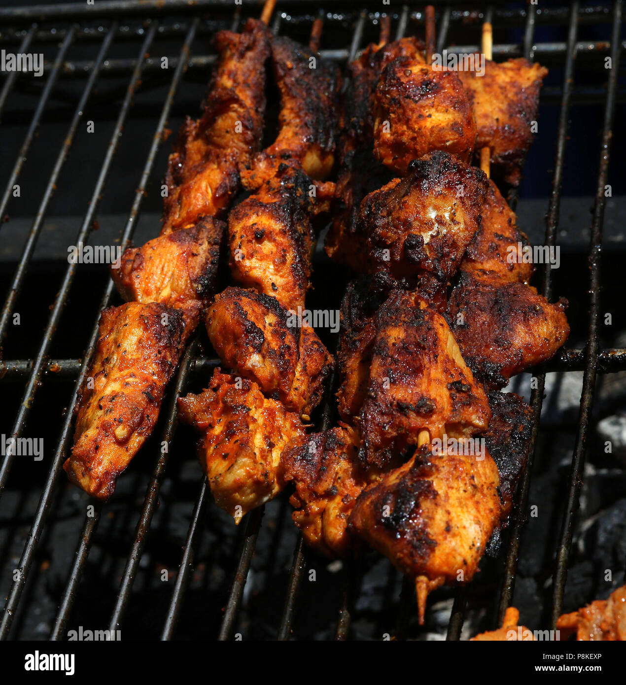 Chicken kebabs on grill Stock Photo Alamy